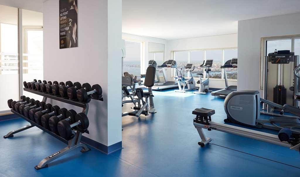 Hotel Jannah Burj Al Sarab Abu Dhabi Interno foto A gym in a hotel