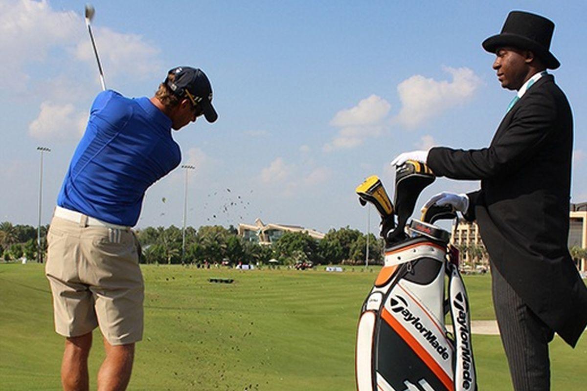 Hotel Jannah Burj Al Sarab Abu Dhabi Esterno foto A golf caddie