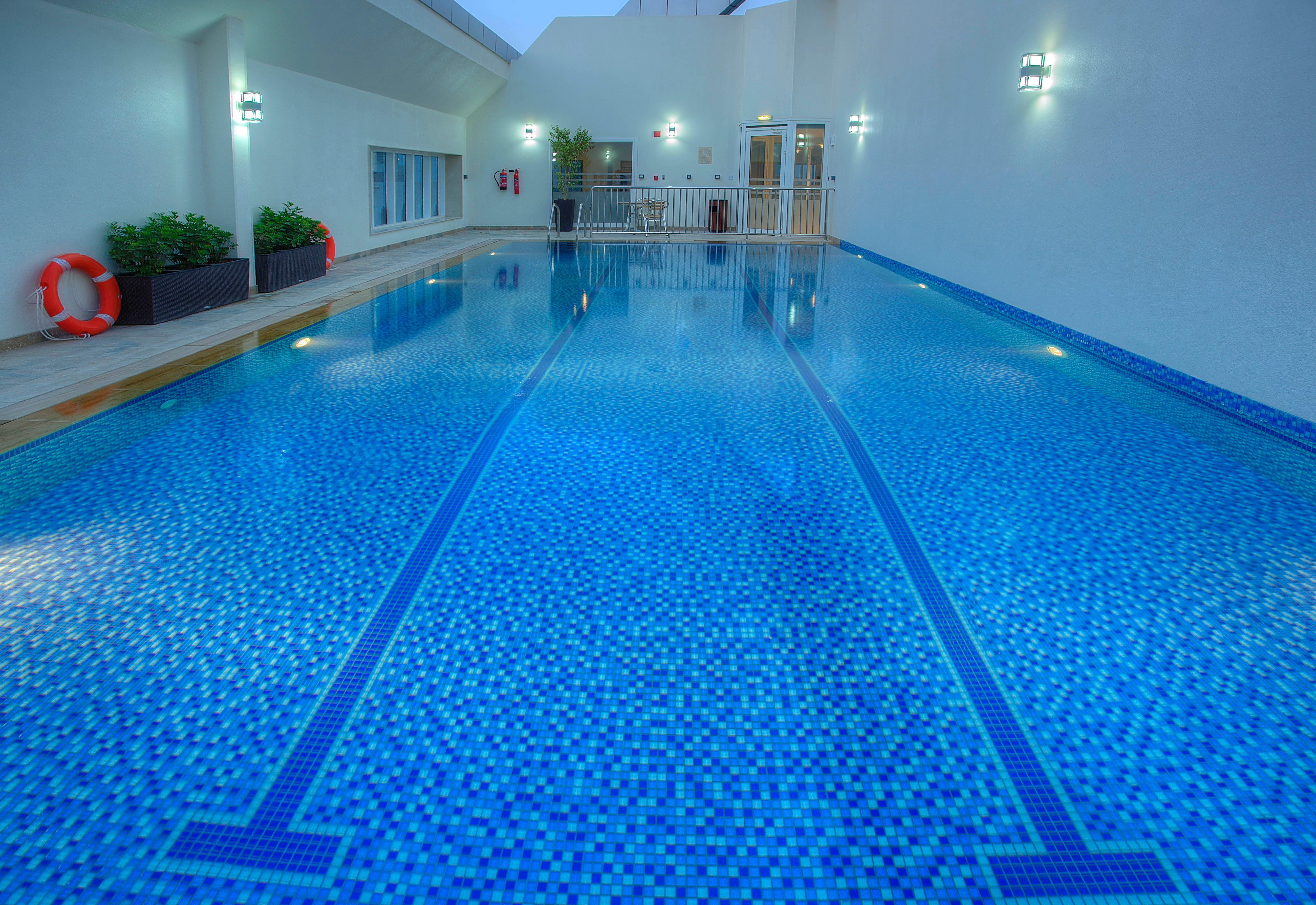 Hotel Jannah Burj Al Sarab Abu Dhabi Esterno foto Swimming pool