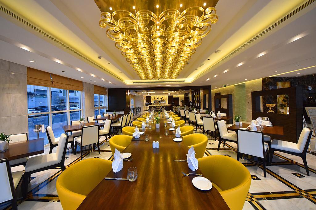 Hotel Jannah Burj Al Sarab Abu Dhabi Esterno foto The restaurant