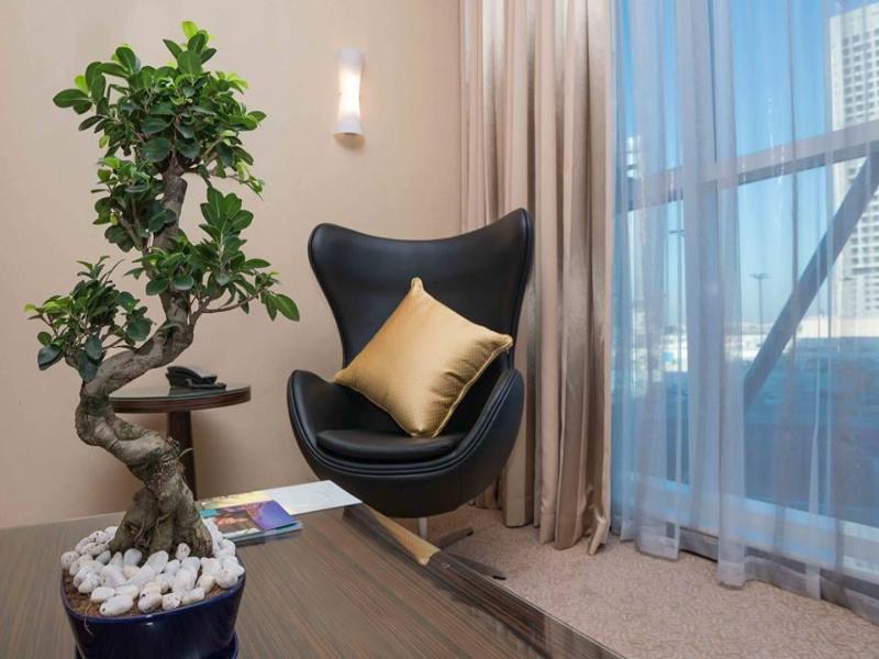 Hotel Jannah Burj Al Sarab Abu Dhabi Esterno foto Ficus benjamina in a home